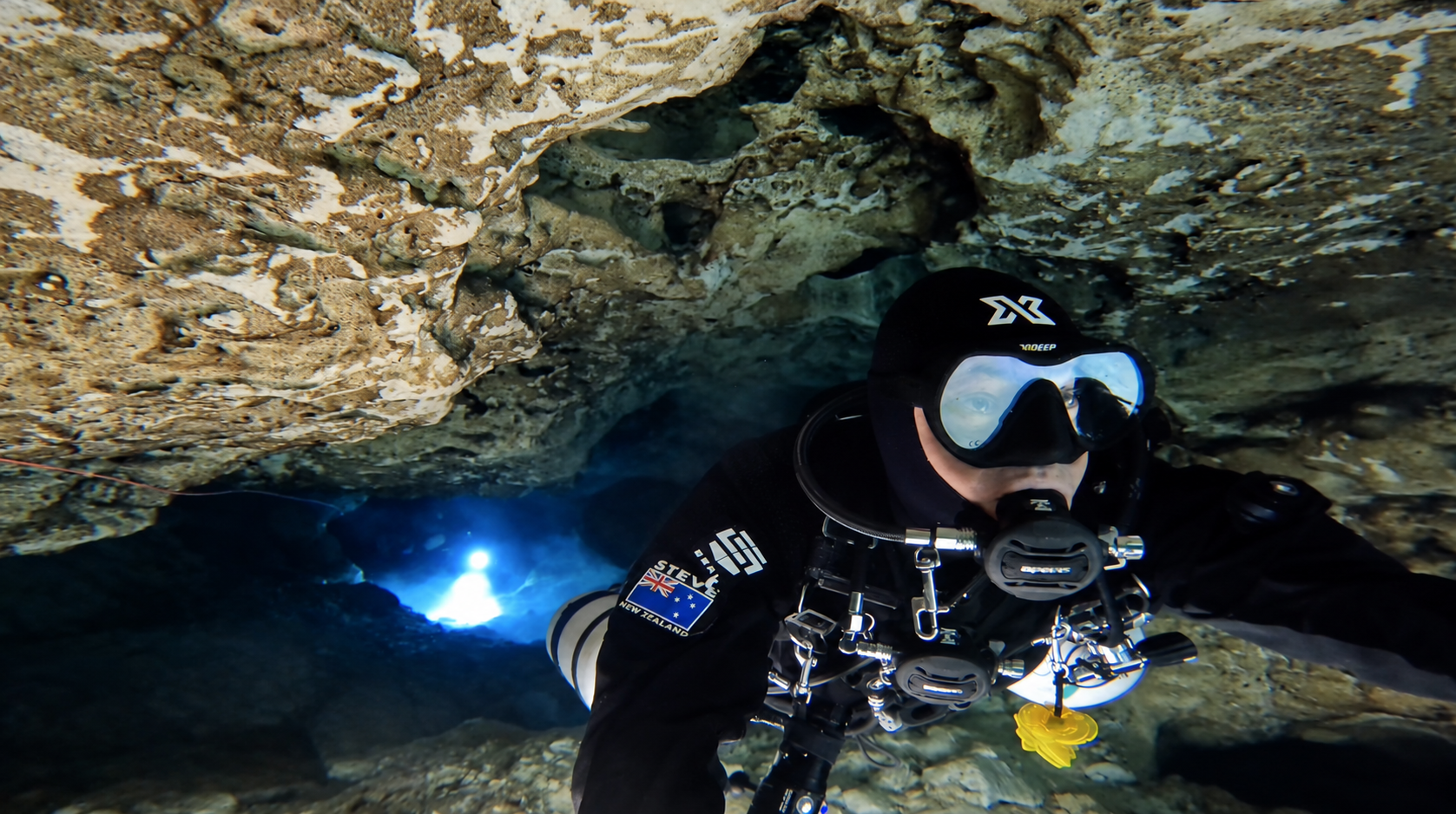 Steve Davis in his SEAL drysuit exploring an underwater cave